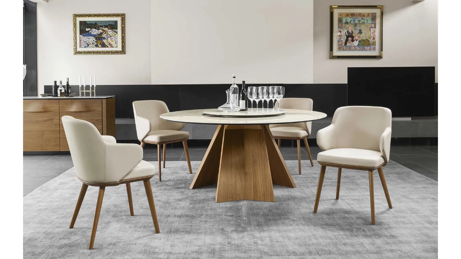 Tavolo rotondo con piano in ceramica e basamento in legno Icaro di Calligaris